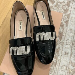 Miu Miu Black Patent Leather Loafers with Crystal Logo